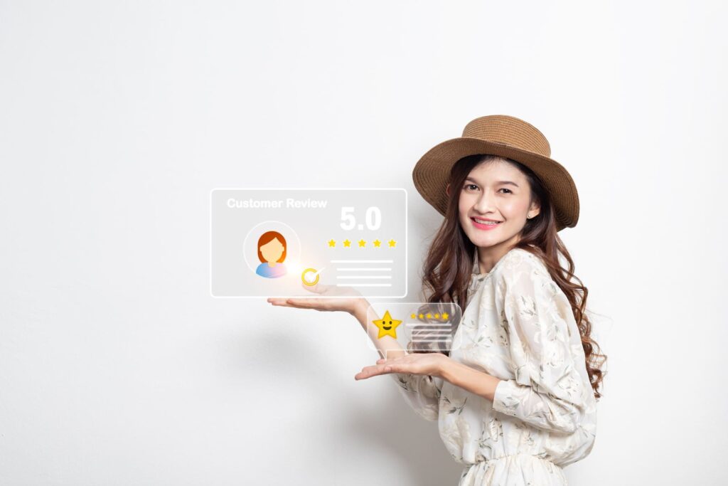 Happy woman showing 5 star reviews